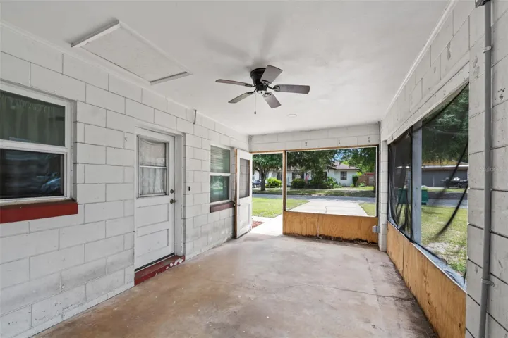 Unit 2 (2 Bedroom 1 Bathroom) screened in porch that can easily be converted back into a carport