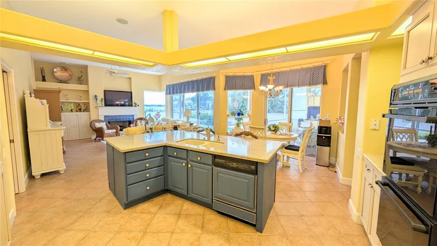 Generous kitchen island with seating for two and has a dedicated ice maker.