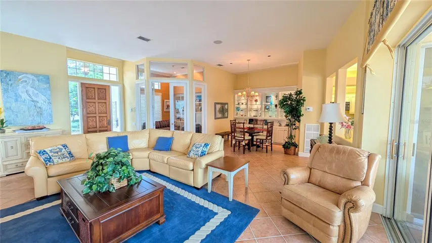 First living room and dining area den/office.