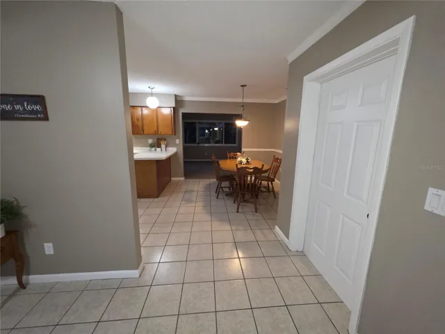 Looking in the kitchen and dining area