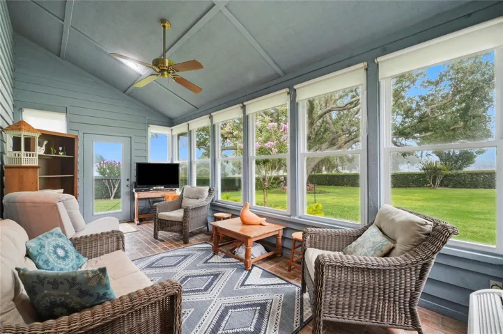 Sunroom off the Kitchen Looking into the Back Yard.