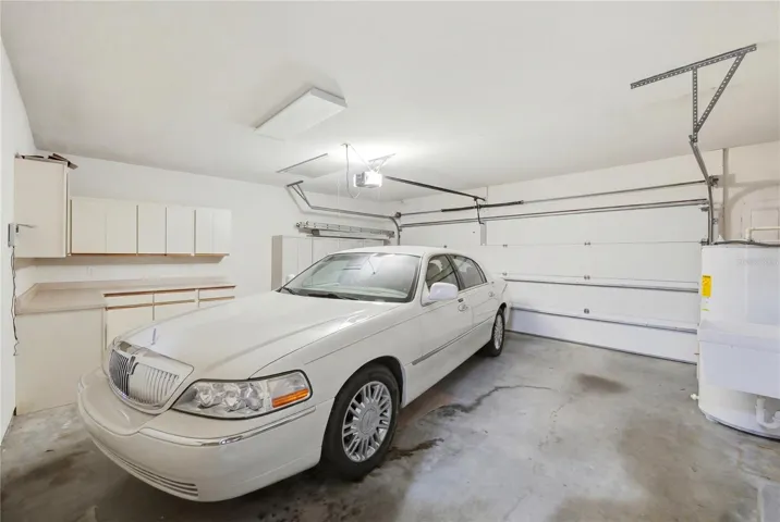 Two Car Side Entry Garage with Cabinets and Attic Access