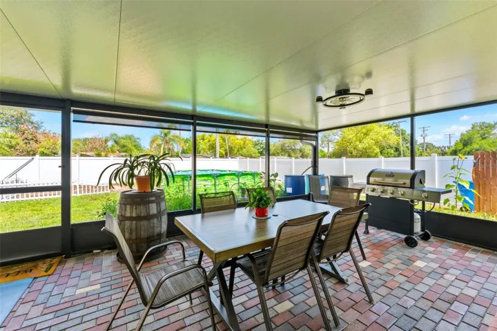 645 SF of Outdoor Living Space - Screened In Patio and Pavers Sealed in 2025, Outdoor Fans 2025, Privacy/Sun Shades 2025