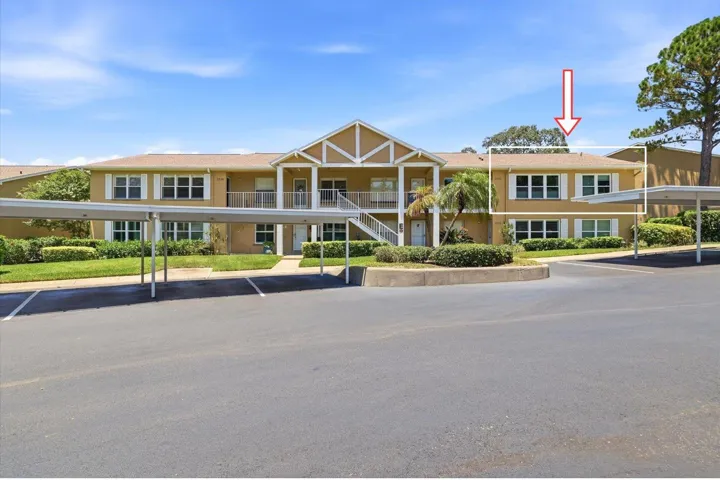Top floor unit facing golf course.