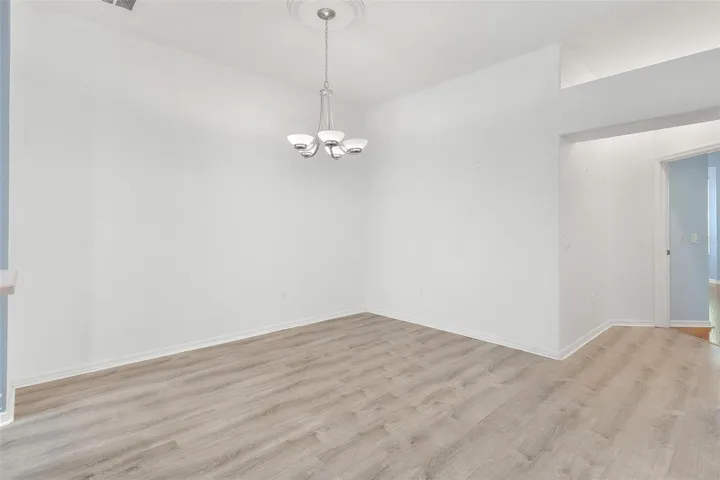 Dining Room overlooks Kitchen and Living Area.