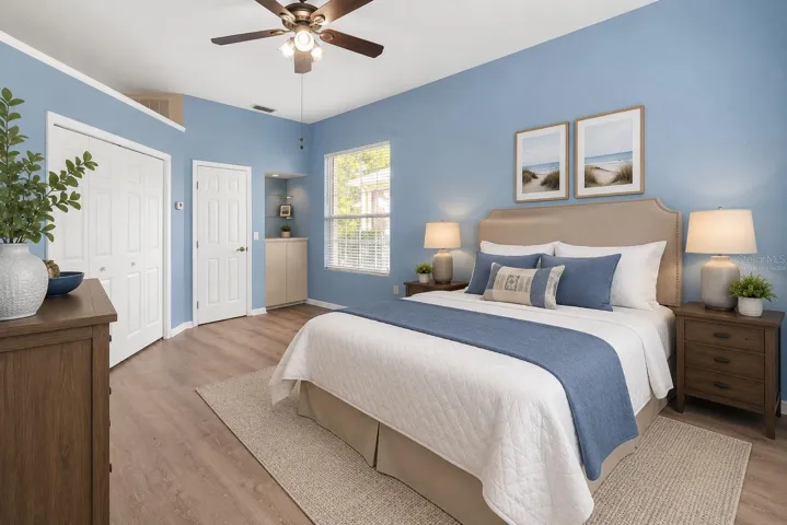 Virtually Staged-Primary Suite #2 features private entry,  wet bar, and built in storage.