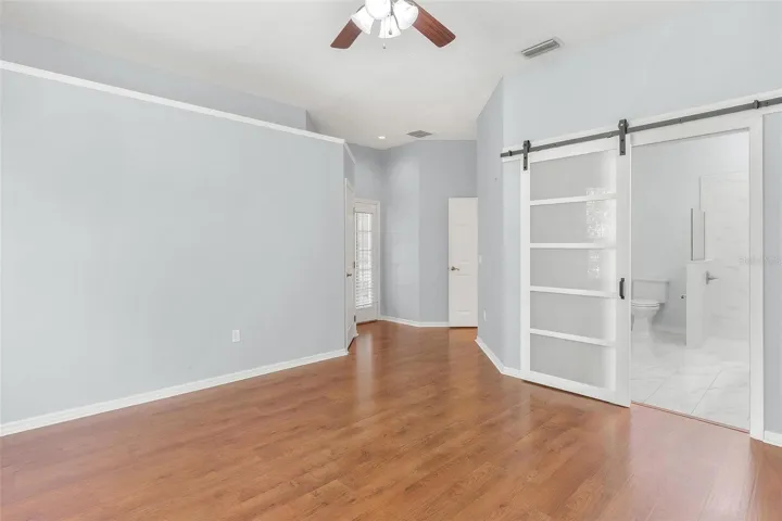 Primary Suite #1 features bay windows and walk in closet
