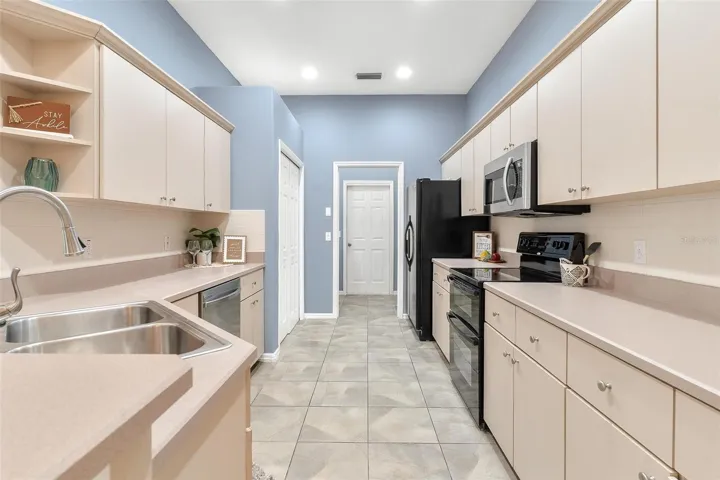 Kitchen over looks dining and living area.