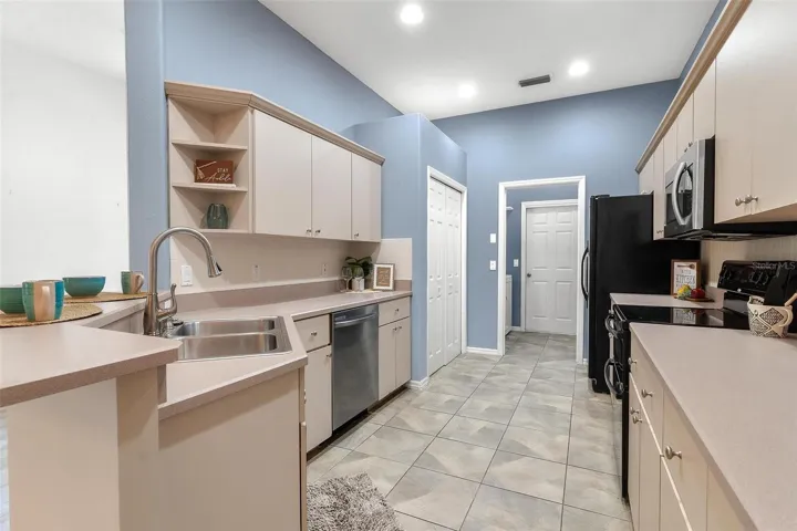 Kitchen over looks dining and living area.