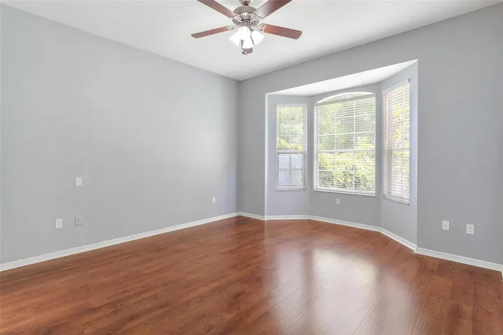 Primary Suite #1 features bay windows and walk in closet