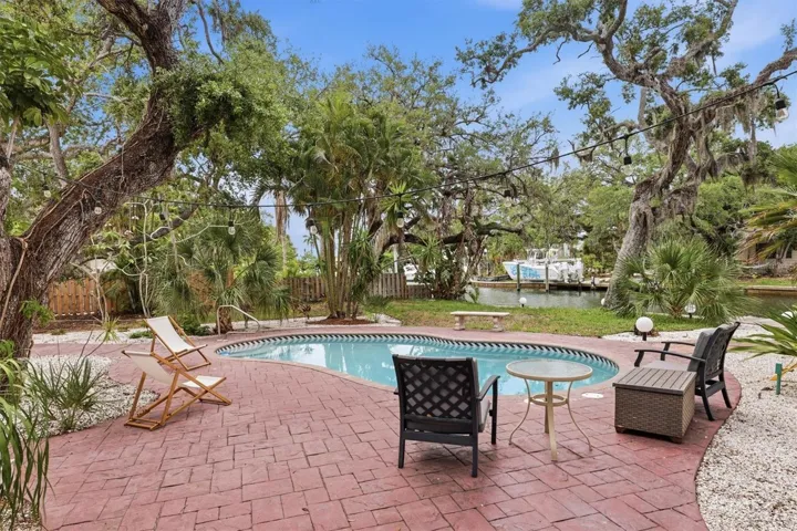 Rear Yard - Private Pool and Dock w Boat Slip