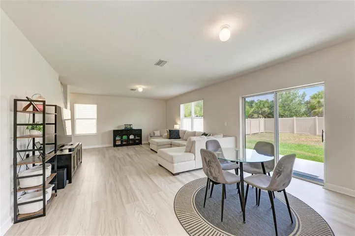 Open dining area into large living room