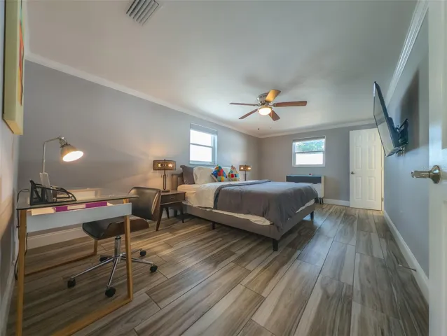 Primary bedroom with room for a King sized bed and desk