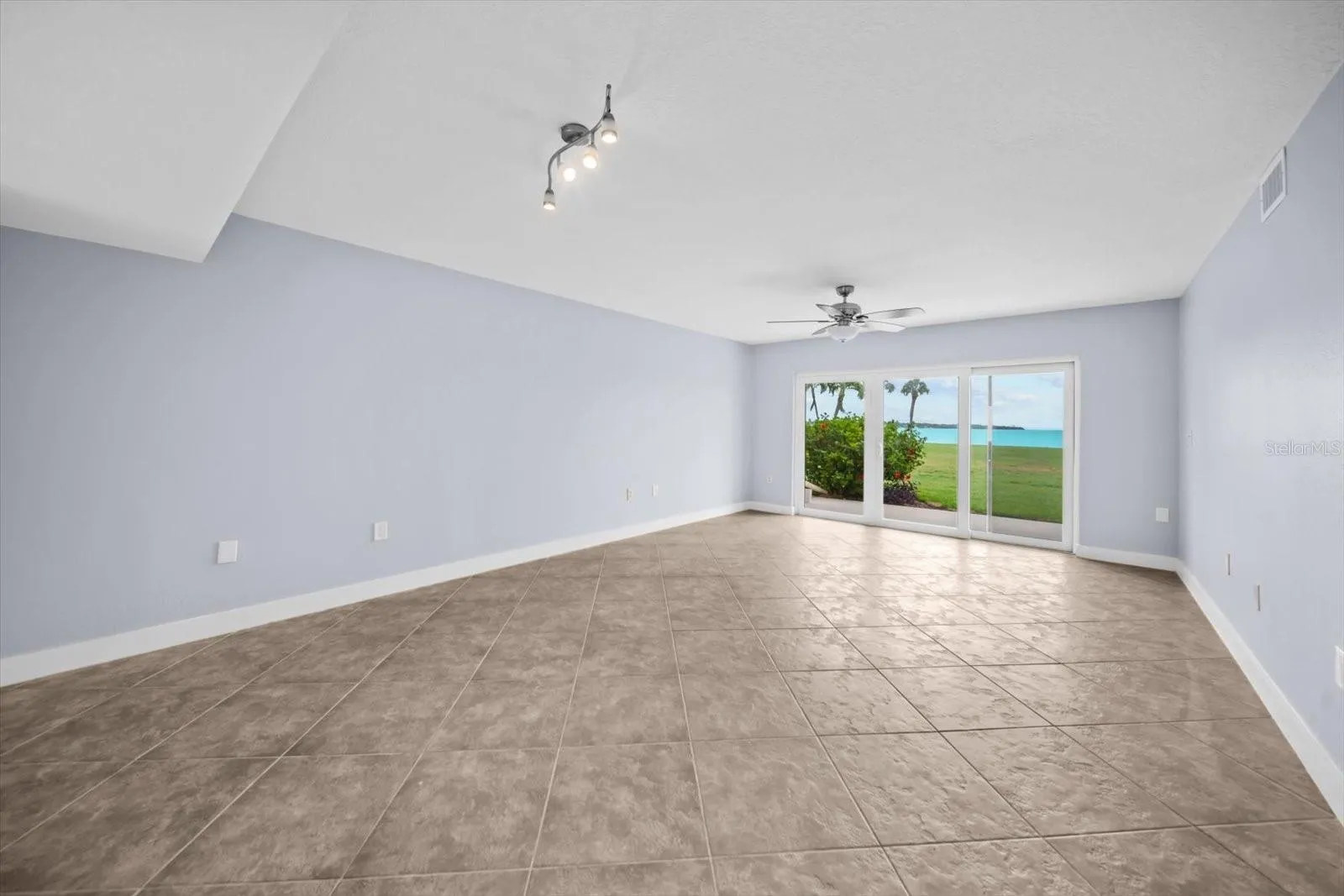 large open concept living area with views of the landscape and the Tampa Bay Water