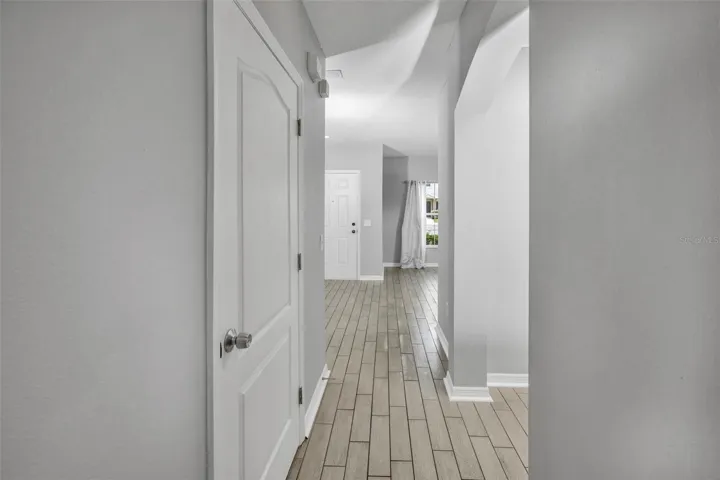 Front entrance with 1/2 bathroom door