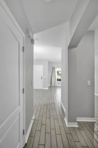 Front entrance with 1/2 bathroom door