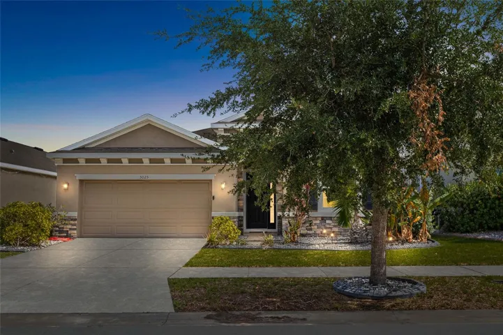 Welcome home to this beautifully maintained 4-bedroom, 2.5-bath home in Southshore Bay, featuring attractive curb appeal, professional landscaping, and a spacious 2-car garage. Built in 2018, this move-in-ready residence offers modern construction, energy efficiency, and a desirable location within one of Wimauma's most sought-after resort-style communities. The extended driveway and welcoming entry create a great first impression for both residents and guests.