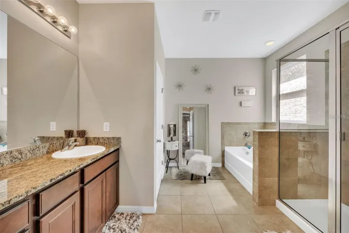 Spa-Inspired Primary Bathroom with Double Vanity, Garden Tub &amp; Walk-In Shower