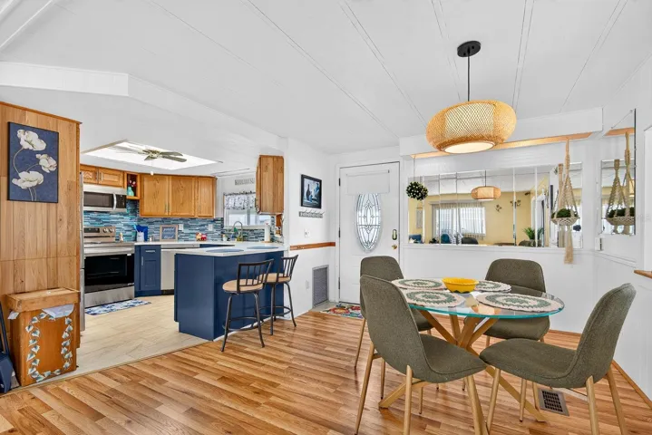 Facing kitchen and dining area from living area