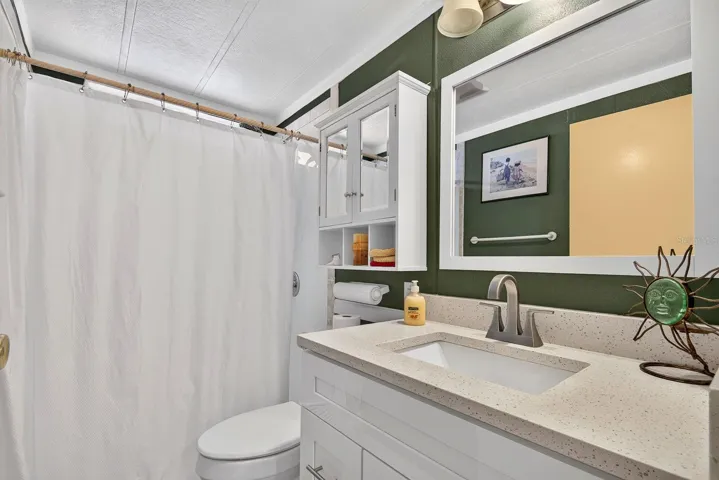 Hallway bath with updated vanity