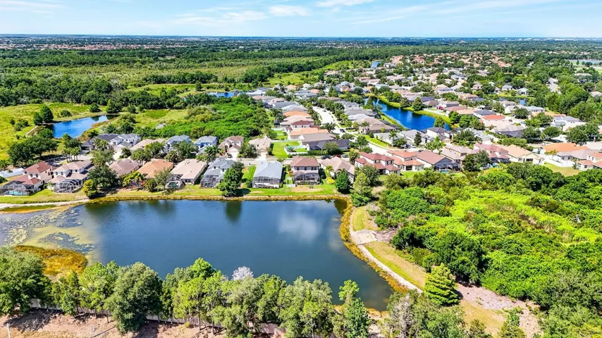 Aerial view facing into neighborhood facing south exposure showcasing Lakewood Ranch Greenbrook