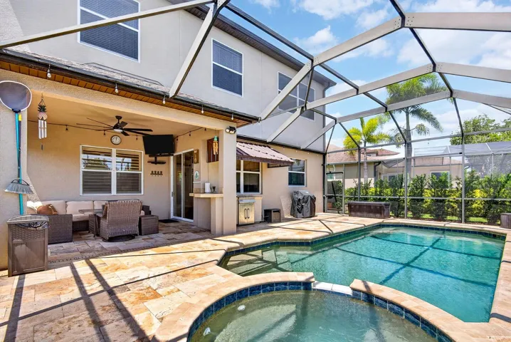 Looking in from back of pool to back of home