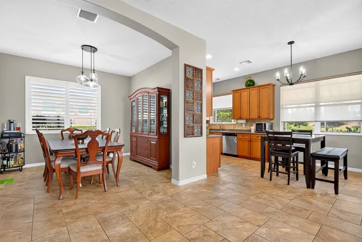 Wide open spaces showing dining and kitchen area