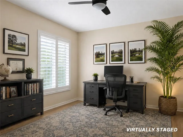VIRTUALLY STAGED (bedroom staged as an office: does have a closet)