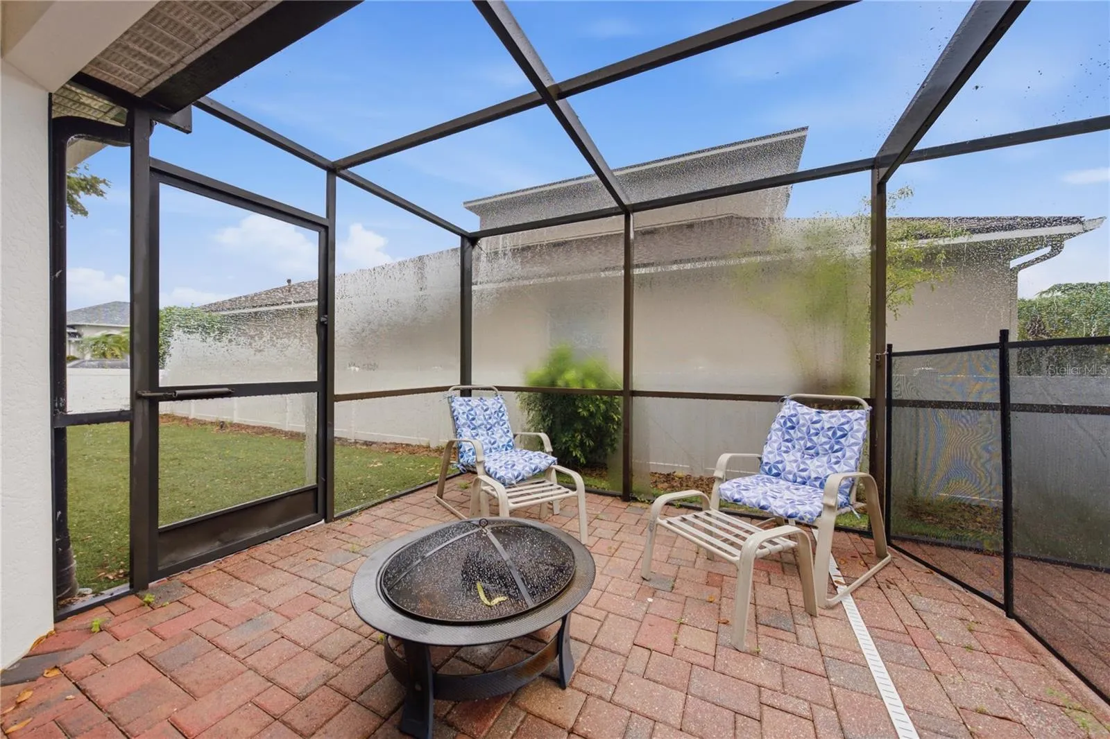 Screened and pavered sitting area