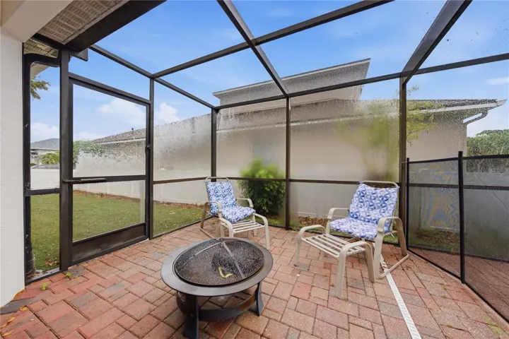 Screened and pavered sitting area