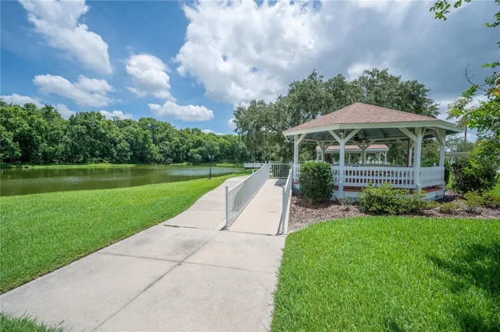 Walking path and gazebo off pond