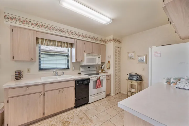 Kitchen with closet pantry