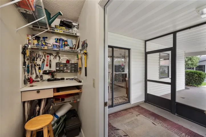 Storage/workshop off screened porch