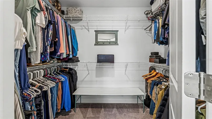 Large walk in closet in primary bedroom