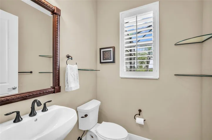 Half bathroom off of kitchen