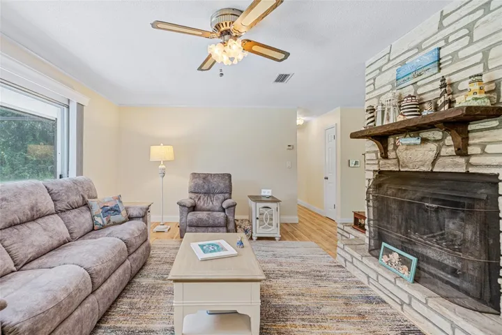 Family Room w Wood Burning Fireplace