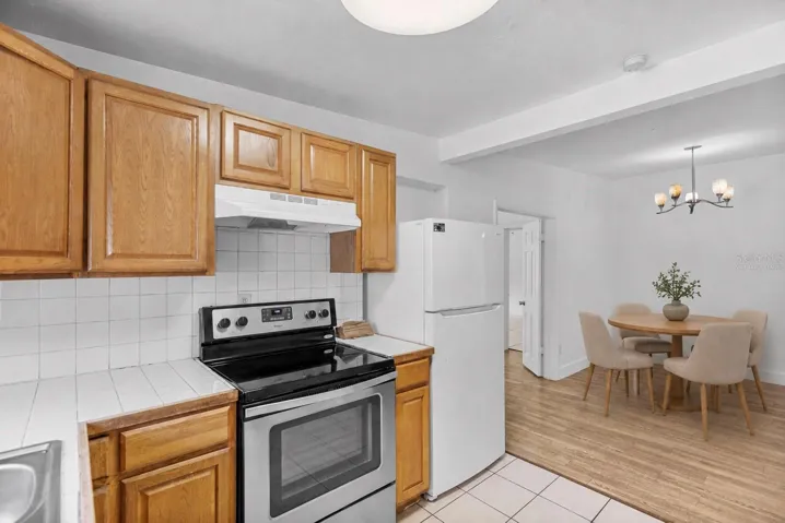Virtually Staged - Kitchen with View of Dining Room