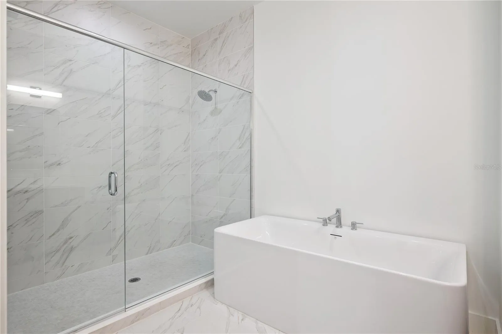 Primary Bath with Dual Sinks/Soak-in Tub and Large Walk-In Shower