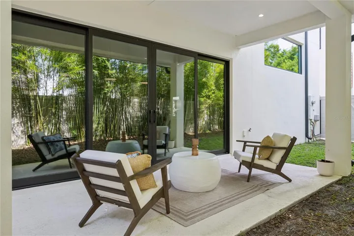 40' x 20' private fenced-in backyard, including a covered patio which extends from the sliding doors.