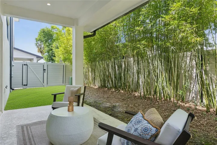 40' x 20' private fenced-in backyard, including a covered patio which extends from the sliding doors.
