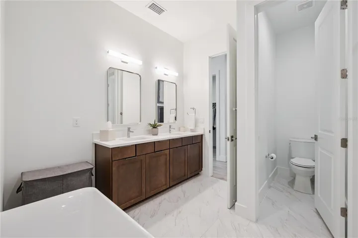 Primary Bath with Dual Sinks/Soak-in Tub and Large Walk-In Shower