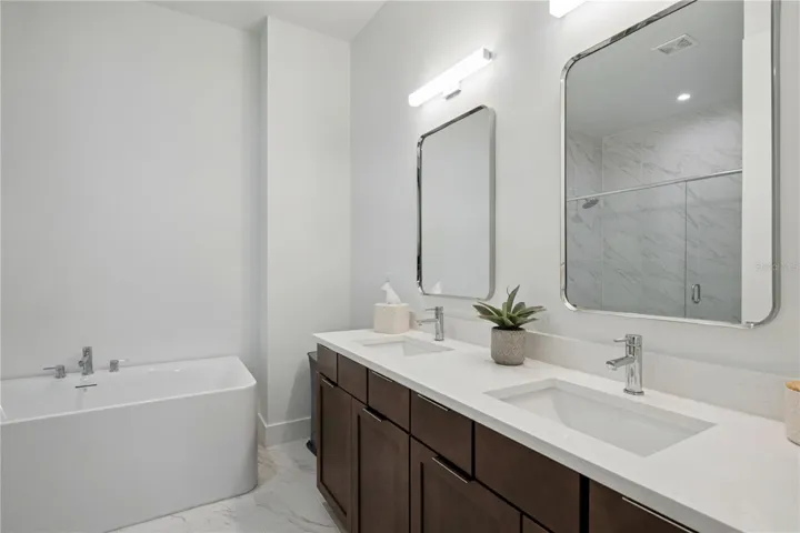 Primary Bath with Dual Sinks/Soak-in Tub and Large Walk-In Shower