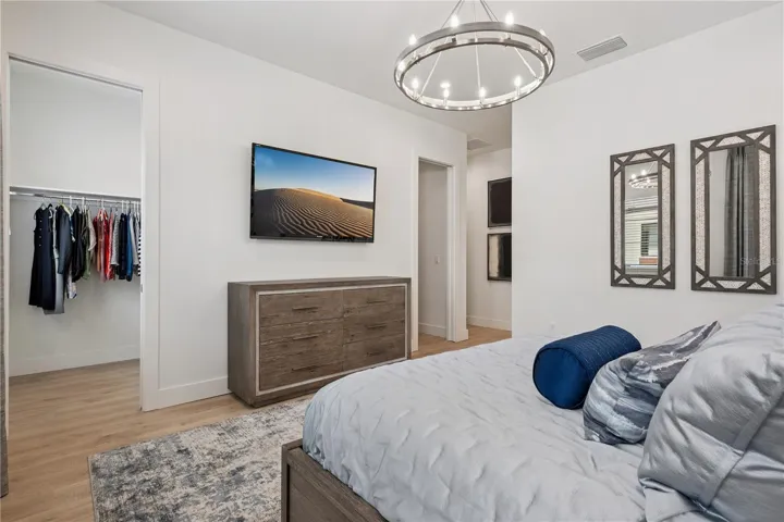 Primary Bedroom with Two Spacious Walk-In Closets and Ensuite