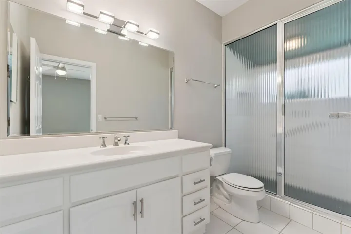 Steam shower with tankless water heater