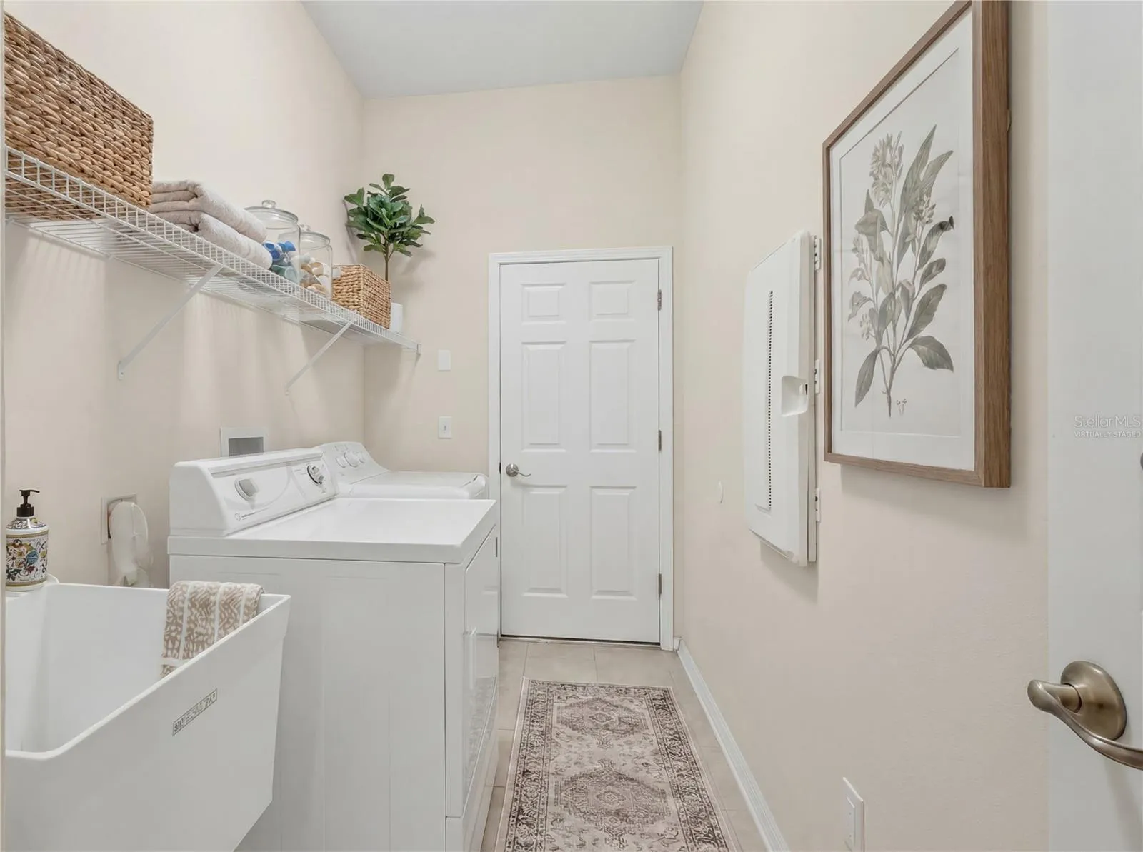 Virtually Staged Laundry Room - 11530 Oyster Bay Circle, New Port Richey, FL 34654