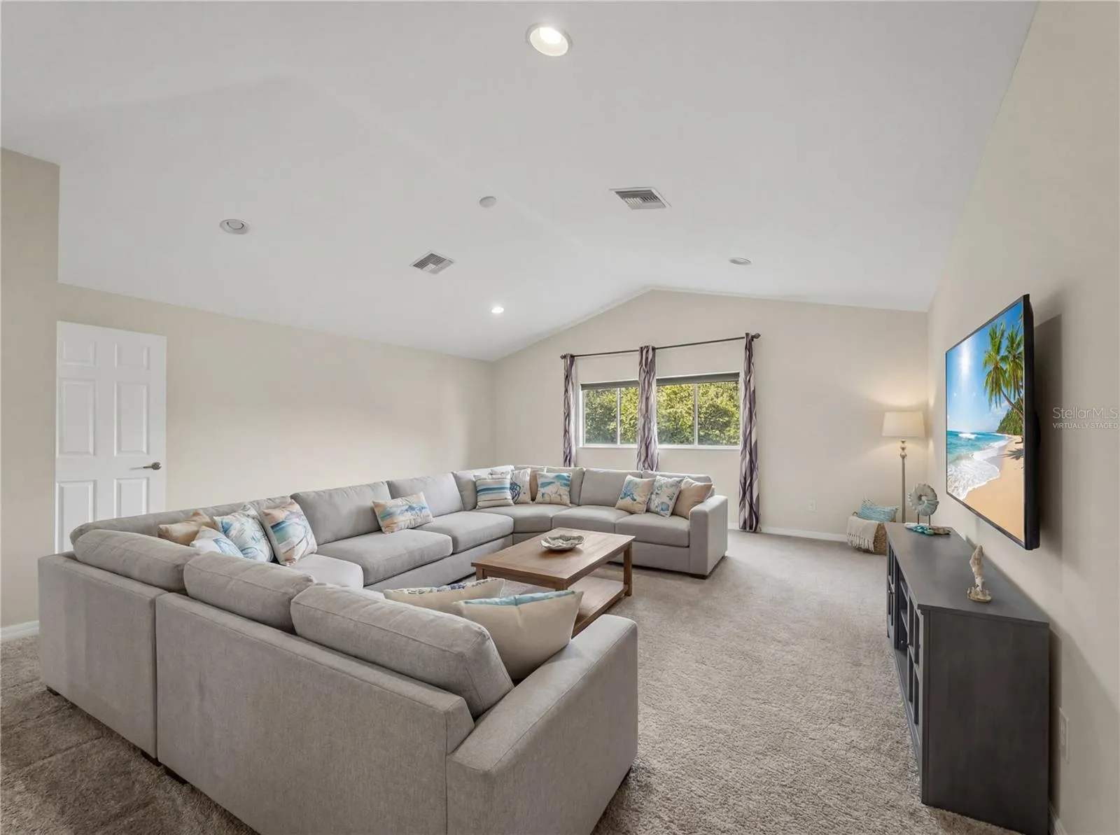 Virtually Staged Upstairs Bonus Room - 11530 Oyster Bay Circle, New Port Richey, FL 34654