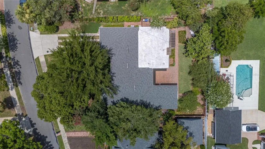 Roof new in 2022.  Flat roof sealed in 2026.  The pool is neighbor's pool.