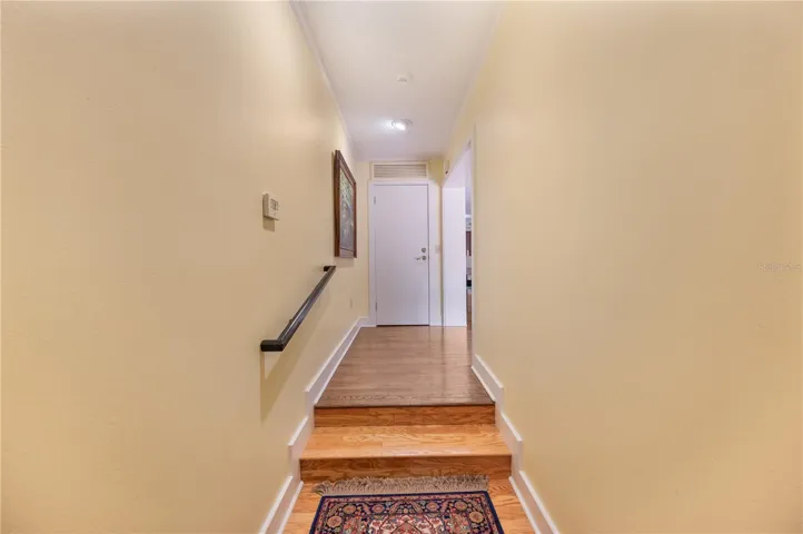 Storage closet at end of stairs
