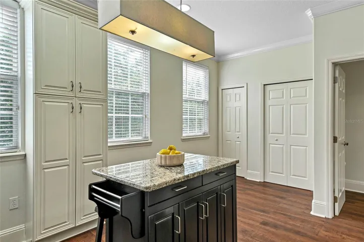 Center Island with Pantry Cabinet plus 2 additional storage closets