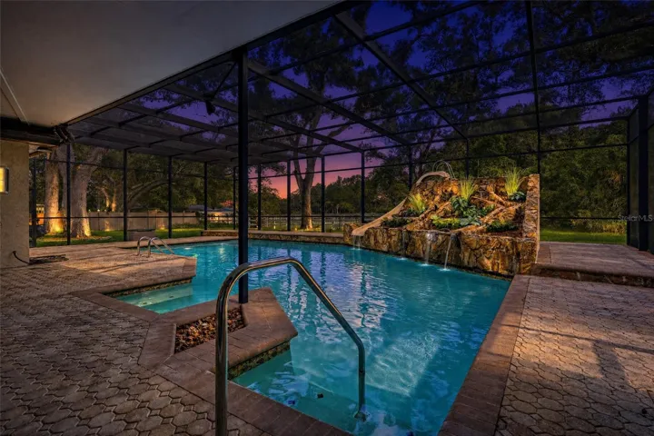 Sparkling Pool with slide, waterfall and screen.